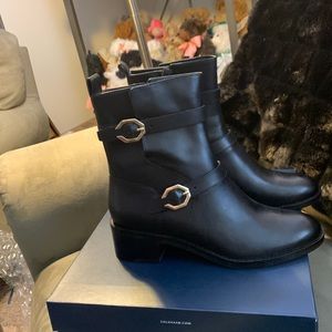 BNWT leather boots with gold buckles.